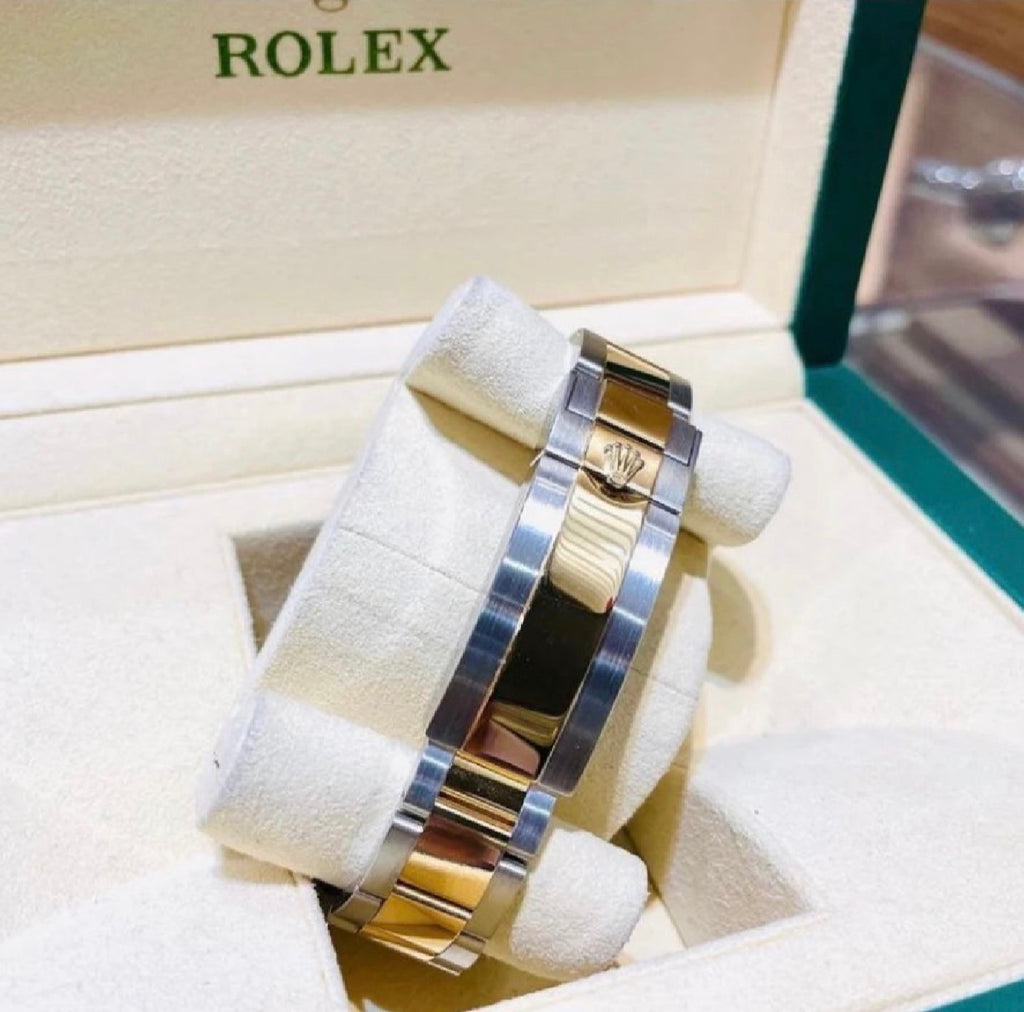 ROLEX SUBMARINER GOLD & BLACK