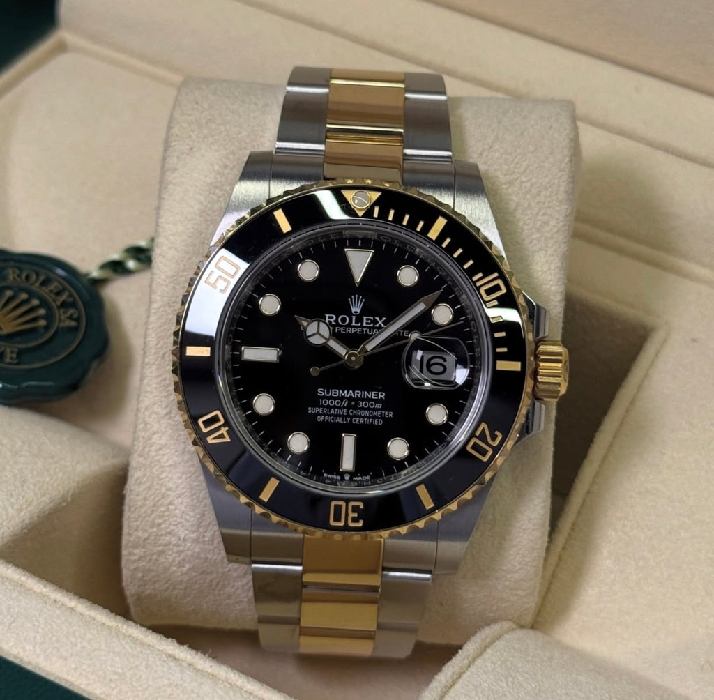 ROLEX SUBMARINER GOLD & BLACK